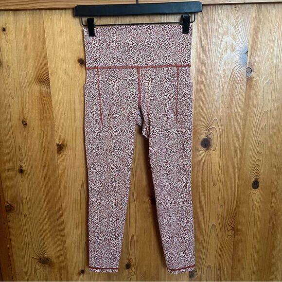 Athleta Rust Cheetah Print Salutation Stash Textured 7/8 Pocket Leggings - Picture 6 of 11